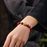 Golden Fortune Empress Red Cinnabar Bracelet with 18K Gold-Plated Zodiac Charm