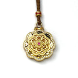 Sand Gold Spinning Mandala Pendant — Reversible Ruby Lotus Necklace