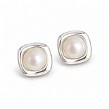 Rose Gold Twisted Hoop Earrings — Modern Classic
